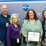 Above: Lewis-Palmer Middle School Gifted/Talented teacher Amy Robinson was recognized by the Air and Space Force Association as Teacher of the Year locally and at the state level. Pictured (L to R): Director Todd Brown, Treasurer Ron Schwarz, Vice President Kris Norris, Secretary Patti Shank, Amy Robinson, Superintendent Amber Whetstine, Lewis-Palmer Middle School Principal Courtney Harrell, and Board President Tiffiney Upchurch. Photo by Jackie Burhans.