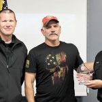 Above: From left, Battalion Chief Micah Coyle, Secretary Jason Buckingham, and Fire Chief Andy Kovacs are pictured at the May 28 Board of Directors meeting after recognizing Buckingham for his service to the district. Photo by Natalie Barszcz.