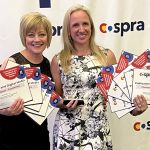 Above: The School District 38 Communications Team won 11 awards at the Colorado School Public Relations Association (COSPRA) Conference June 4–6 in Breckenridge. Amy Matisek, communications director for Lewis-Palmer School District 38 is on the left. The team’s Social Media Specialist and Photographer Stephanie Gonzalez (right) was named Communications Rookie of the Year. The team’s other awards were for writing, design, photography, and video. The honors were chosen by school public relations professionals from across the country. Photo by Tyler Dumas.