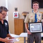 Above: Ben Bowland led an Eagle Scout project assembling and installing three benches in The Preserve common area in South Woodmoor. He raised funds for materials and led a crew of six Boy Scouts to complete the work. At the July 23 Woodmoor Improvement Association meeting, President Brian Bush and Director of Common Areas Steve Cutler presented Bowland with a plaque and thanked him for his leadership. Pictured from left are Vice President Peter Bille, Cutler, Bowland, and Bush. Pictured from left: Cutler, Bowland, and Bush. Photo by Jackie Burhans.